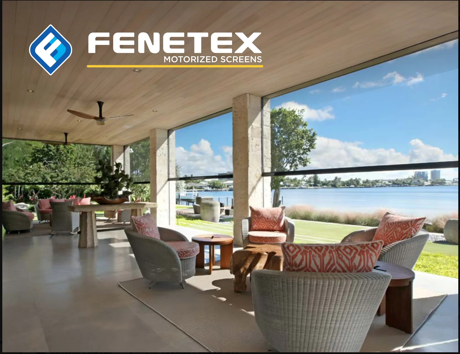 Fenetex motorized screens shading a waterfront patio, illustrating late-summer backyard shade options