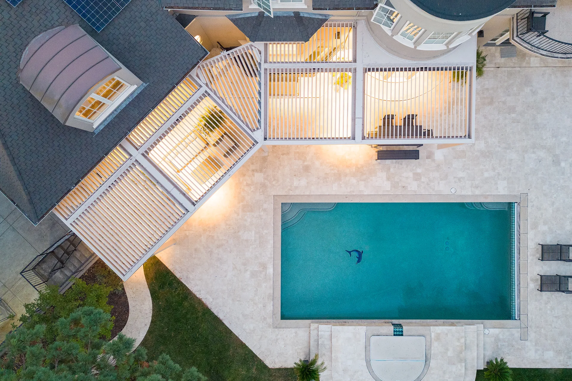 Drone view of a backyard pergola construction project